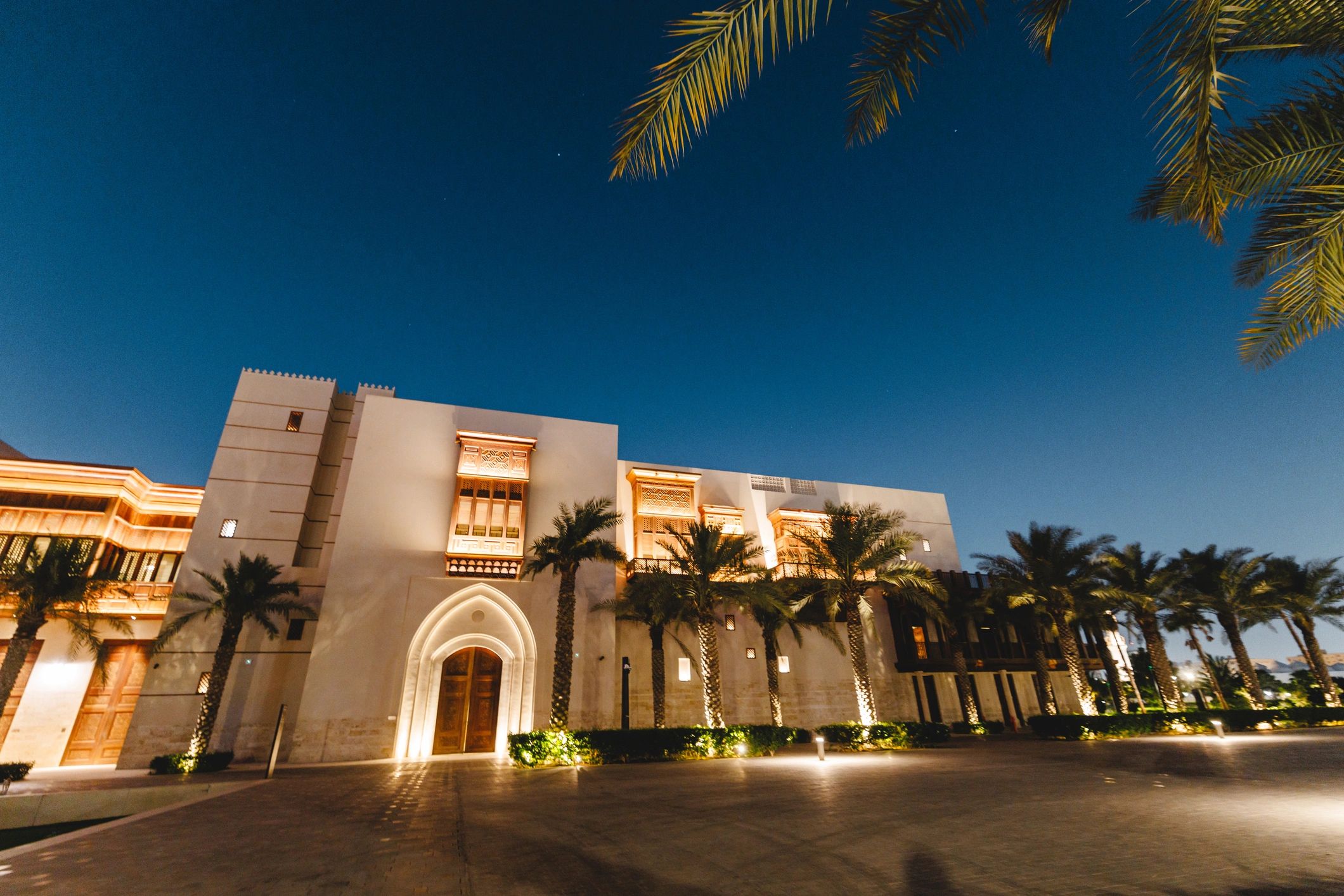 Modern hotel entrance at dusk